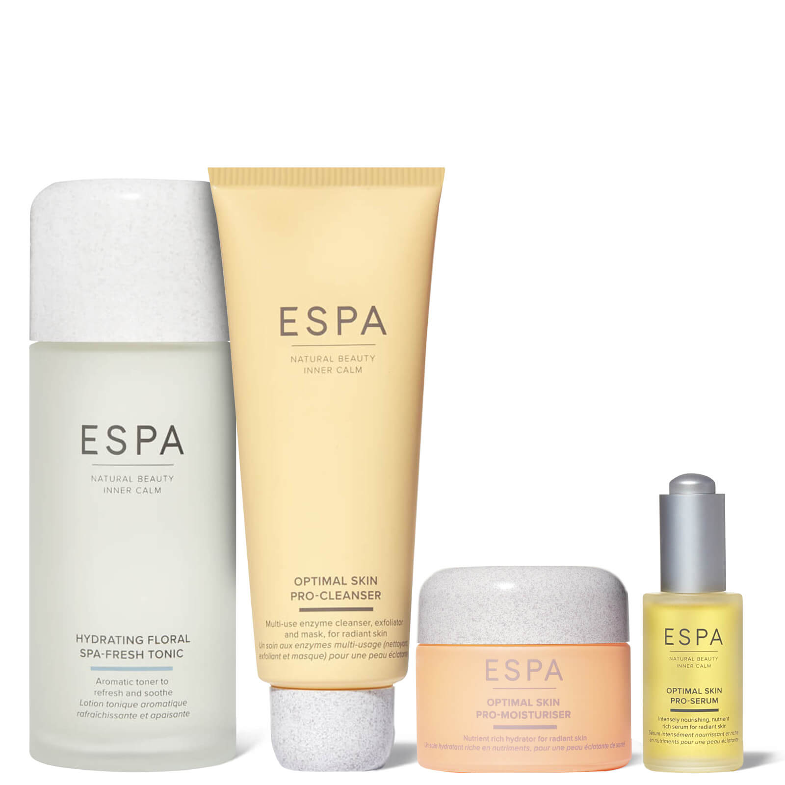 ESPA Optimal Skin Pro-Serum is a small glass bottle with a yellow serum, featuring a dropper lid, surrounded by other ESPA skincare products in soft pastel packaging.