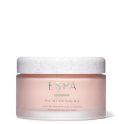 Pink hair and scalp mud treatment mask in a round, frosted glass jar with a white textured lid, labeled "ESPA" in elegant font, 180ml size.