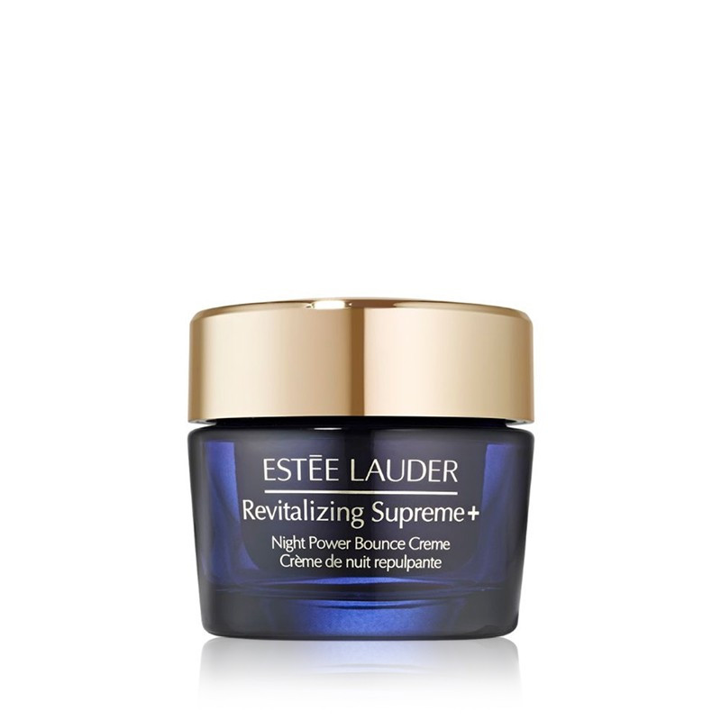 A sleek, dark blue glass jar with a gold lid, labeled "Estée Lauder Revitalizing Supreme+ Night Power Bounce Crème Moisturiser 50ml."