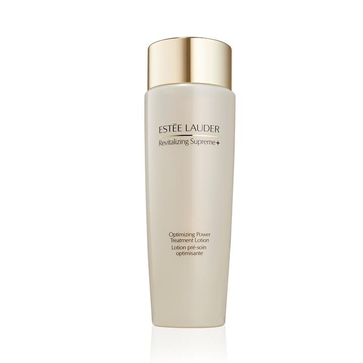 A sleek, tall bottle of Estée Lauder Revitalizing Supreme+ lotion, featuring a cream-colored body, gold cap, and elegant branding, containing 200 ml of product.