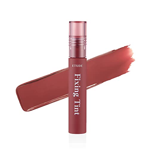 ETUDE Fixing Tint in 06 Soft Walnut features a sleek tube with a pink cap, showcasing a rich, warm brown tint swatch beside it, ideal for long-lasting color.