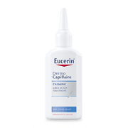 White plastic bottle with a pointed applicator top, labeled "Eucerin DermoCapillaire Calming Urea Scalp Treatment 100ml," featuring blue and red accents, designed for dry, irritated skin.