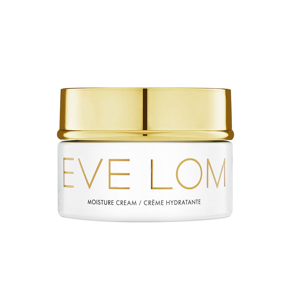 White jar with a gold lid, featuring the text "EVE LOM" prominently on the front, labeled as "Moisture Cream / Crème Hydratante."