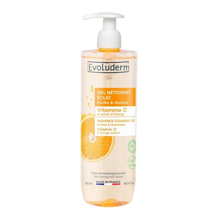 Clear plastic bottle with a pump dispenser, containing 500 ml of orange gel cleanser labeled "Gel Limpiador Vitamina C" by Evoluderm, featuring an orange slice graphic.
