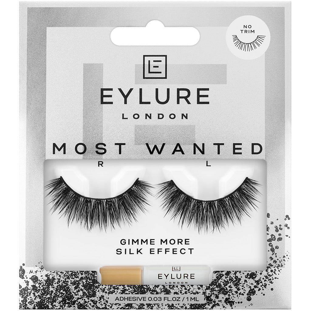 Eylure Most Wanted Lashes in "Gimme More" feature dramatic, fluffy black silk-effect lashes, packaged with adhesive in a sleek, stylish box with a glittery design.