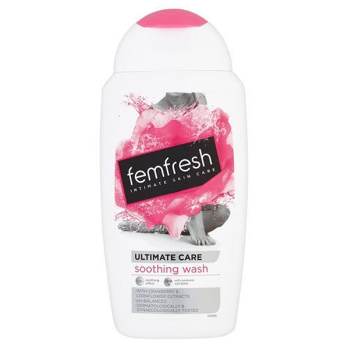 Femfresh Intimate Soothing Wash in a 250ml white bottle with a pink cap, featuring a vibrant pink splash design and text highlighting "Ultimate Care" and "soothing wash."