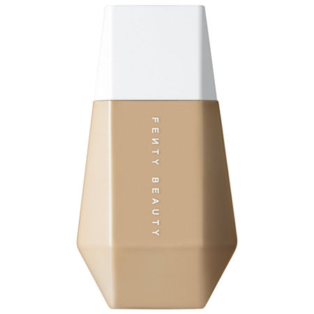 Fenty Beauty Eaze Drop Blurring Skin Tint in a geometric tan bottle with a white cap, featuring the brand name in bold white letters on the front.