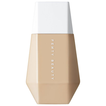 Beige hexagonal bottle of Fenty Beauty Eaze Drop Blurring Skin Tint with a white cap, featuring the brand name in bold letters on the front.