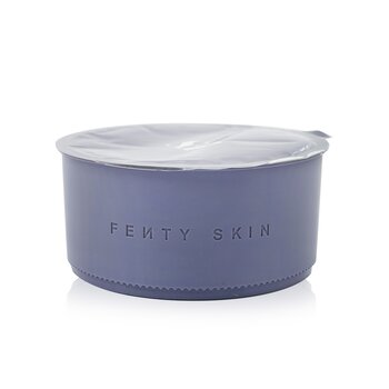 Round, lavender container of Fenty Skin Butta Drop Whipped Oil Body Cream, featuring a smooth surface and embossed brand name, topped with a clear plastic seal.