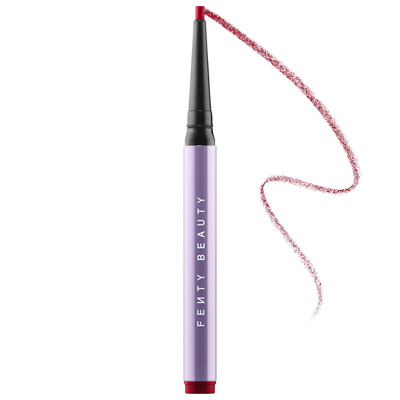 Fenty Beauty Flypencil Longwear Cherry Punk Eyeliner in a sleek purple casing with a fine tip, featuring a vibrant cherry red pencil line beside it.