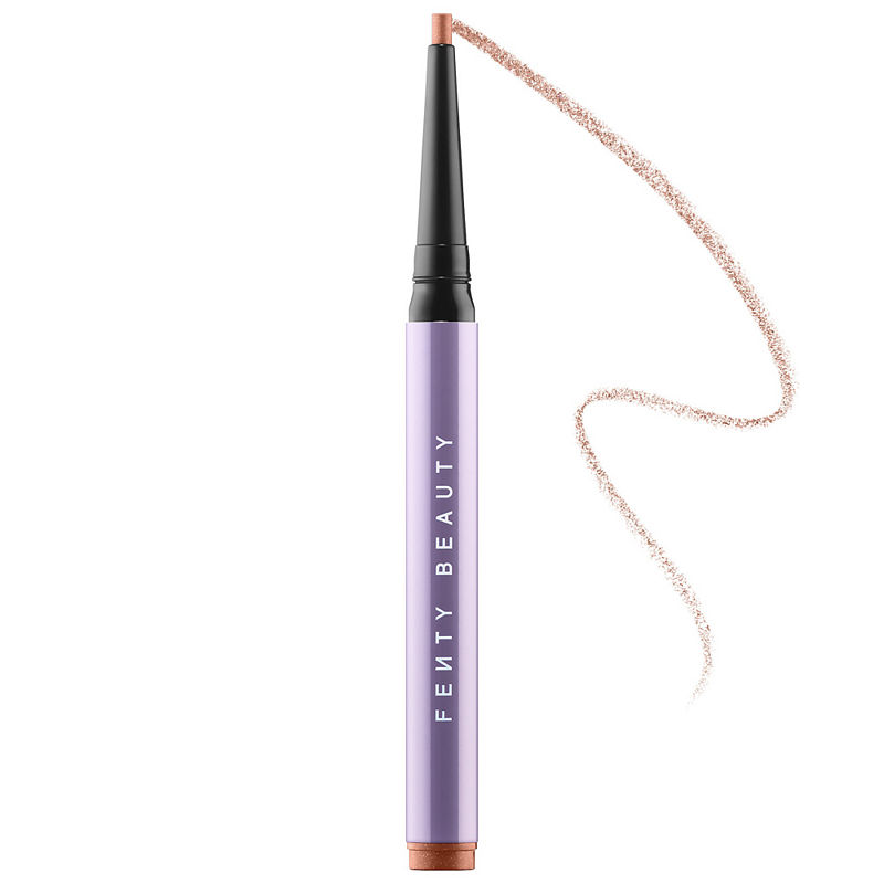 Fenty Beauty Flypencil Longwear Pencil Eyeliner in a sleek, lavender tube with a black tip, featuring a swatch of soft, shimmery copper color alongside it.