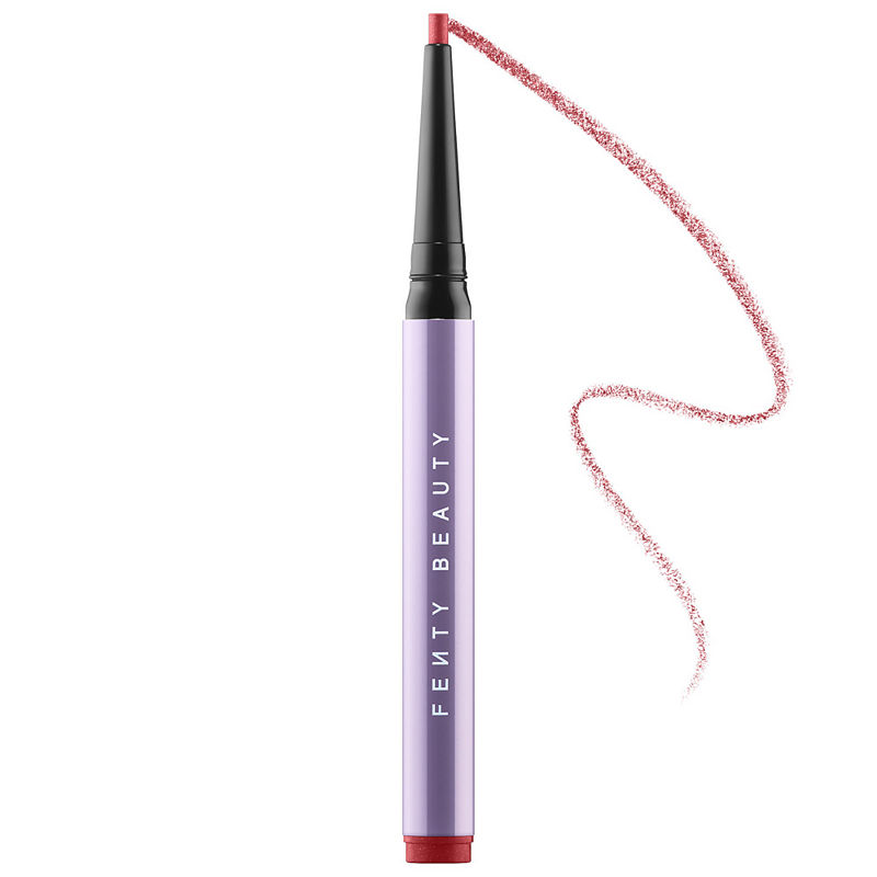 Fenty Beauty Flypencil Longwear Pencil Eyeliner in Spagetti Strapz features a sleek purple casing with a fine tip and a swatch of soft red-brown eyeliner.