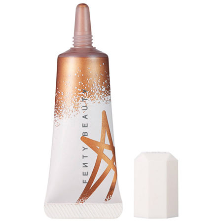 Liquid highlighter in a sleek, metallic bronze tube with a pointed applicator, featuring a white cap and Fenty Beauty branding in black.