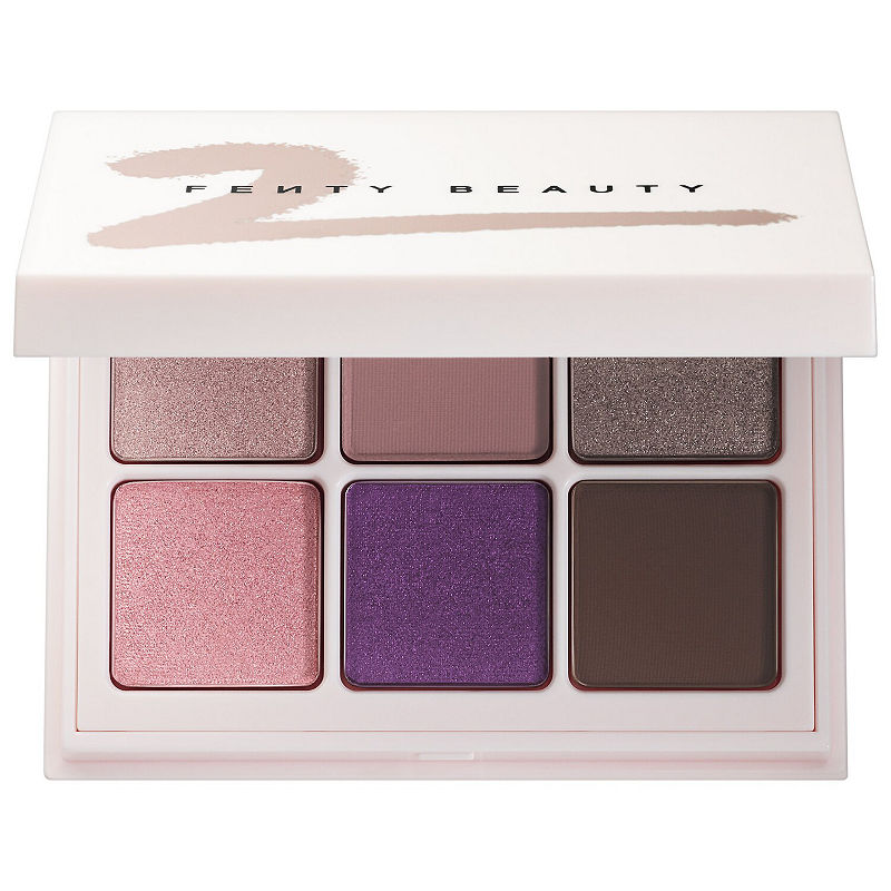 Snap Shadows palette featuring six cool-toned eyeshadows in shades of pink, purple, and brown, housed in a sleek white compact with the Fenty Beauty logo.