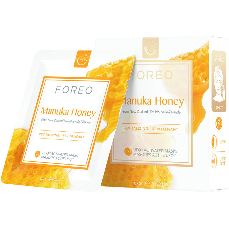 Foreo Ufo™ Manuka Honey Revitalizing Mask box featuring a honeycomb design, with six individual sachets, each labeled "Manuka Honey," emphasizing revitalizing properties.