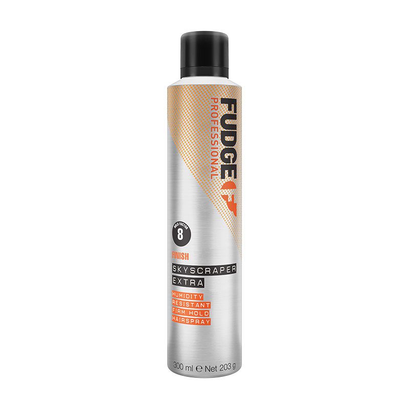 Silver cylindrical canister of Fudge Skyscraper Extra Firm-Hold Hairspray, featuring an orange and black label, humidity-resistant formula, and 300ml capacity.