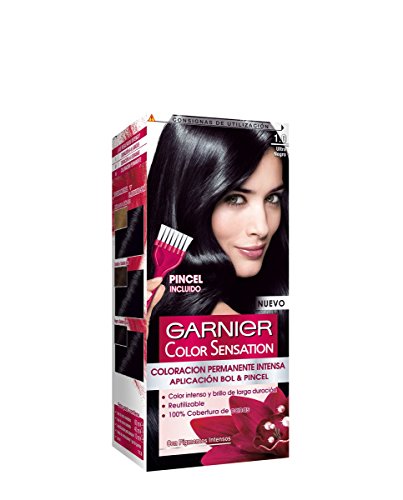 Garnier Color Sensation 1 Ultra Black hair dye box featuring a model with shiny black hair, a white applicator brush, and bold pink and black packaging with product details.