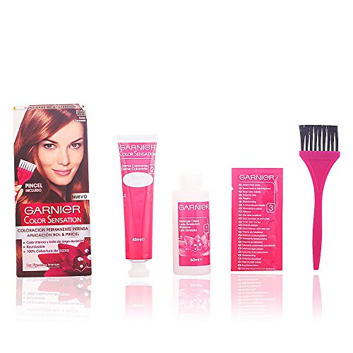 Garnier Color Sensation 6.35 Caramel Blonde kit includes a pink box, a color cream tube, a developer bottle, a pair of gloves, and an application brush, all in vibrant pink packaging.