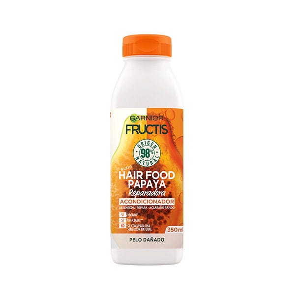 White bottle with an orange cap, featuring a vibrant papaya design and "Garnier Fructis Hair Food Papaya Repairing Balm" label, 350ml size, emphasizing natural ingredients.