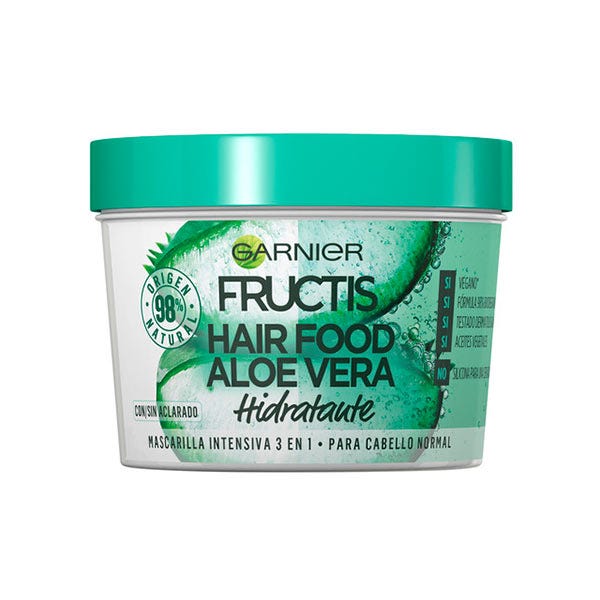 Green plastic container with a turquoise lid, labeled "Garnier Fructis Hair Food Aloe Vera Hydrating Mask," featuring aloe vera graphics and a 390 ml capacity.