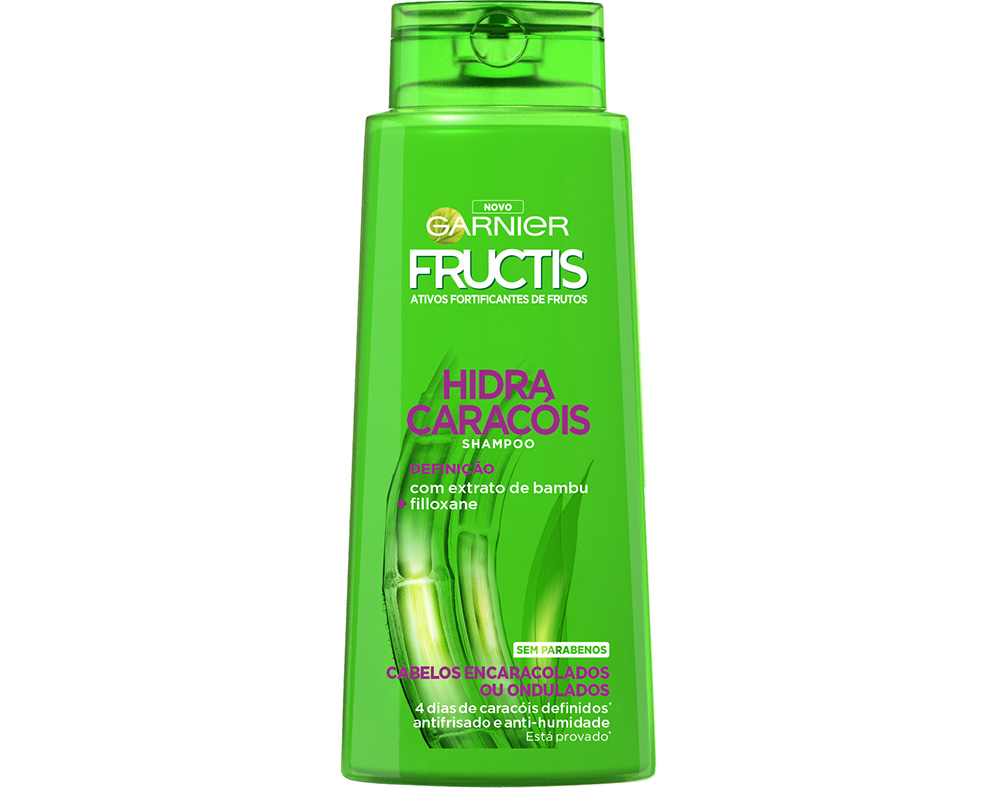 Bright green plastic bottle of Garnier Fructis Nutri Rizos Fortifying Shampoo, featuring a flip-top cap and bold text highlighting bamboo extract and anti-frizz properties, 690ml size.