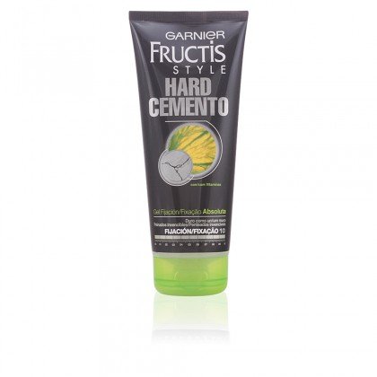 Green and black squeeze tube of Garnier Fructis Style Hard gel, featuring a textured grip, with "Hard Cemento" prominently displayed on the front.