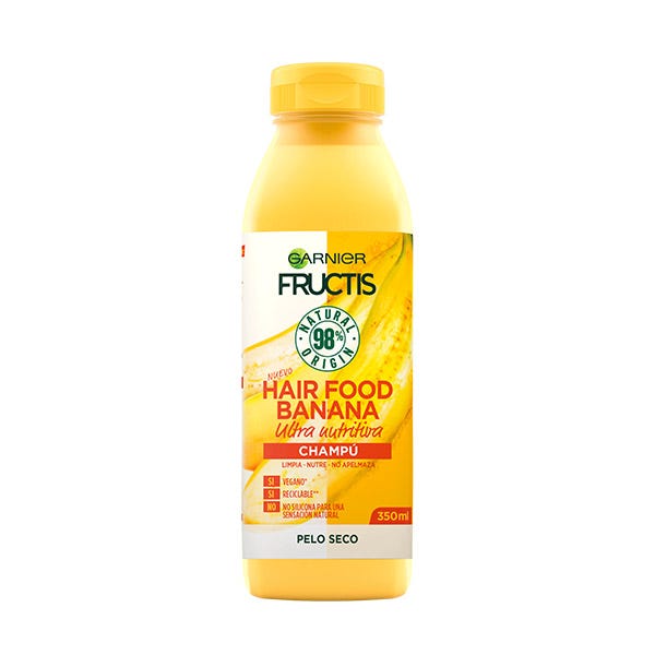 Garnier Fructis Hair Food Shampoo in a 350 ml yellow bottle, featuring a banana design and "Ultra Nutrient" label, ideal for dry hair.