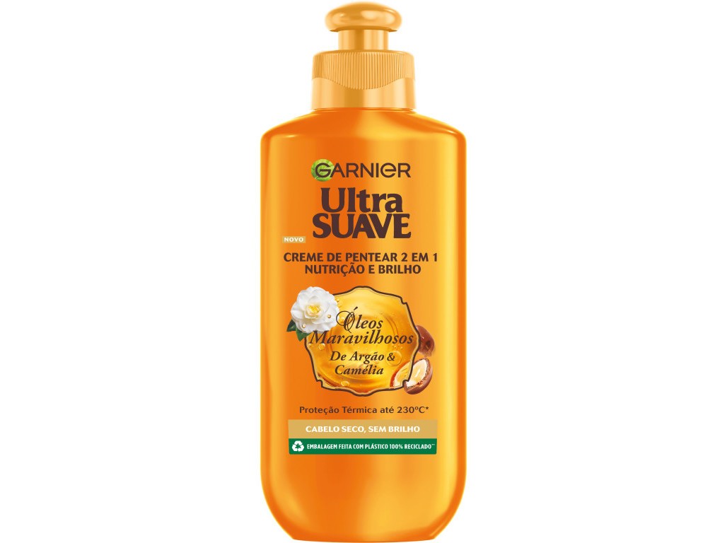 Orange plastic bottle with a pump top, labeled "Ultra Suave" by Garnier, featuring white floral graphics and text highlighting nourishment and shine for dry hair.