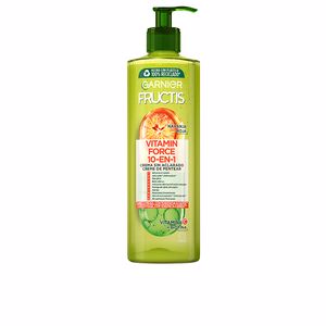 Green plastic bottle of Garnier Fructis Vitamin Force Leave-in Cream, featuring a pump dispenser and vibrant fruit graphics, labeled as a 10-in-1 treatment, 400ml size.