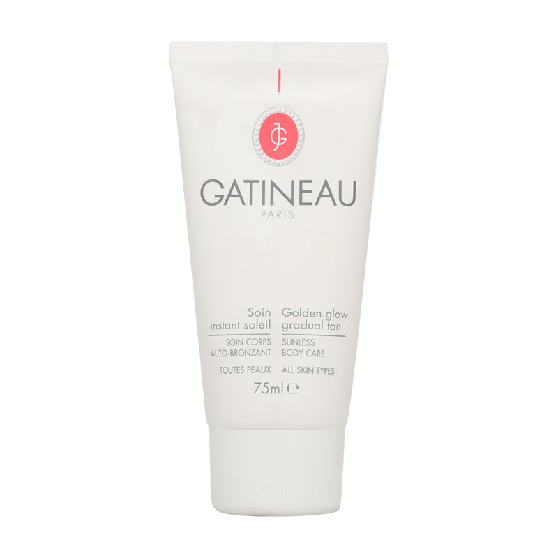 Gatineau Golden Glow Gradual Tan 75ml tube, white with red and black text, featuring coconut oil and vitamin E, designed for all skin types, promoting a sun-kissed glow.
