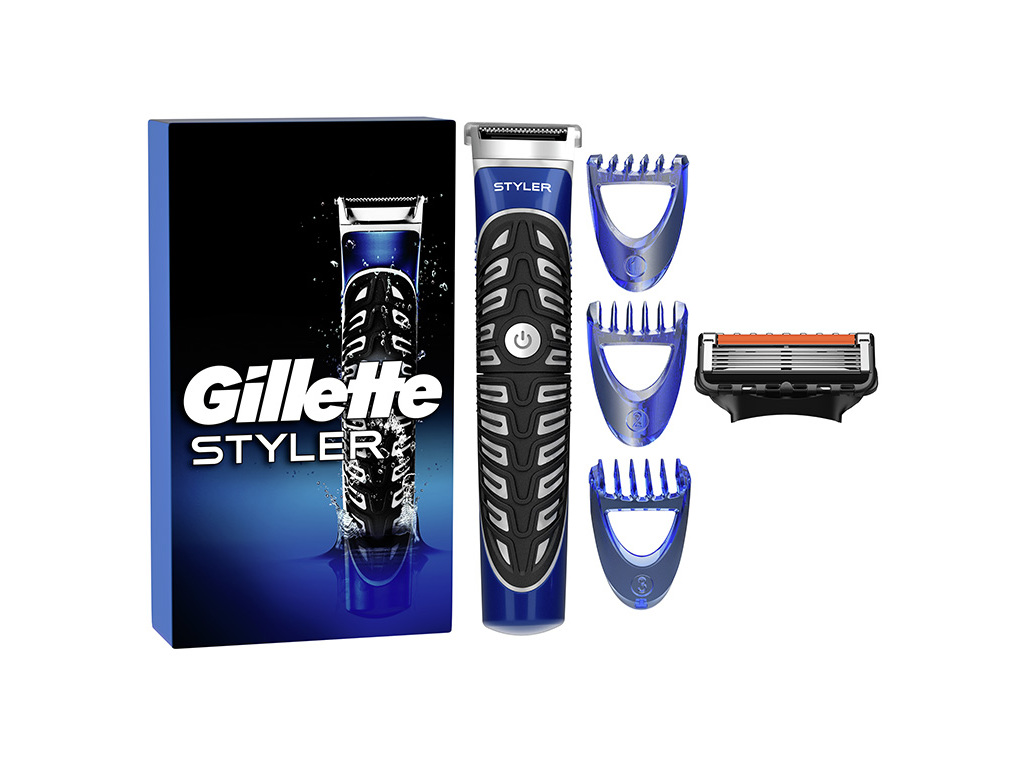 Gillette All-in-One ProGlide Styler features a sleek blue and black design, includes a trimmer, three comb attachments, and a razor cartridge, all packaged in a vibrant box.