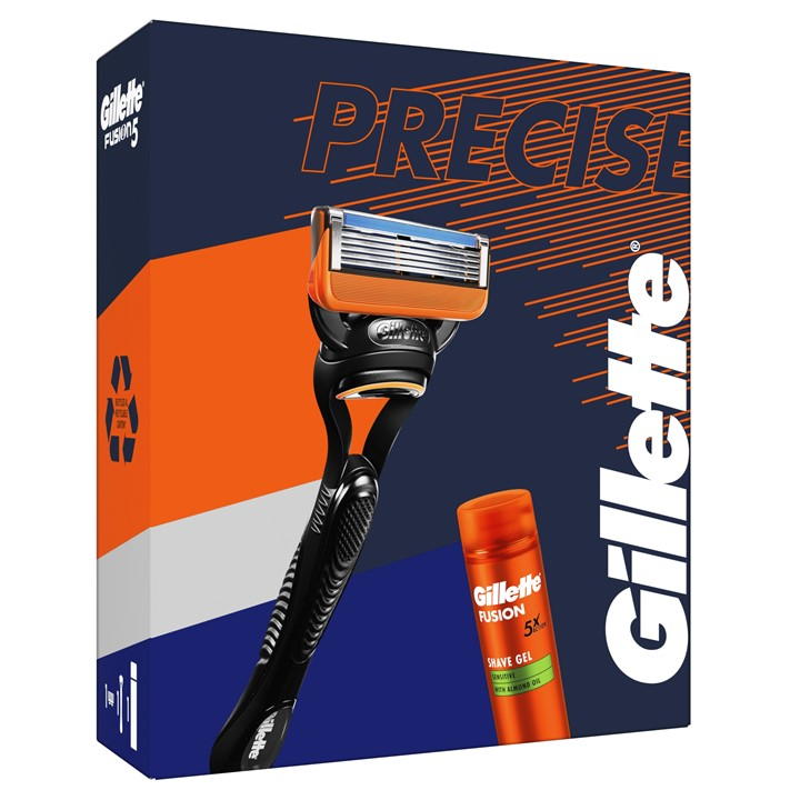 Gillette Fusion Gift Set featuring an orange and black razor with five blades and a can of shaving gel, packaged in a vibrant box with bold graphics.
