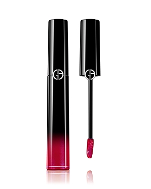 Giorgio Armani Ecstasy Lacquer in shade 506 features a sleek black tube with a gradient red base, accompanied by a doe-foot applicator with a glossy, vibrant pink-red formula.