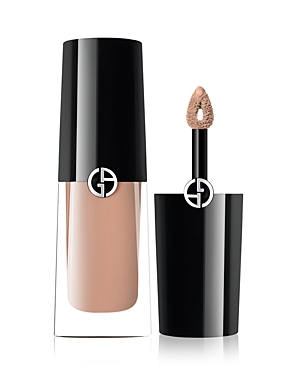 Armani Beauty Eye Tint in 18 Light Nude features a sleek black cap, transparent base showcasing a soft nude liquid, and a doe-foot applicator for precise application.