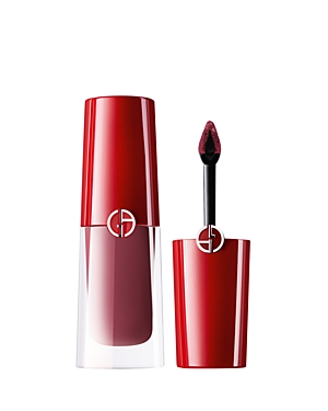 Deep red liquid lipstick in a sleek, glossy red and clear tube, featuring a pointed applicator for precise application, labeled "600 Nomade" by Armani Beauty.