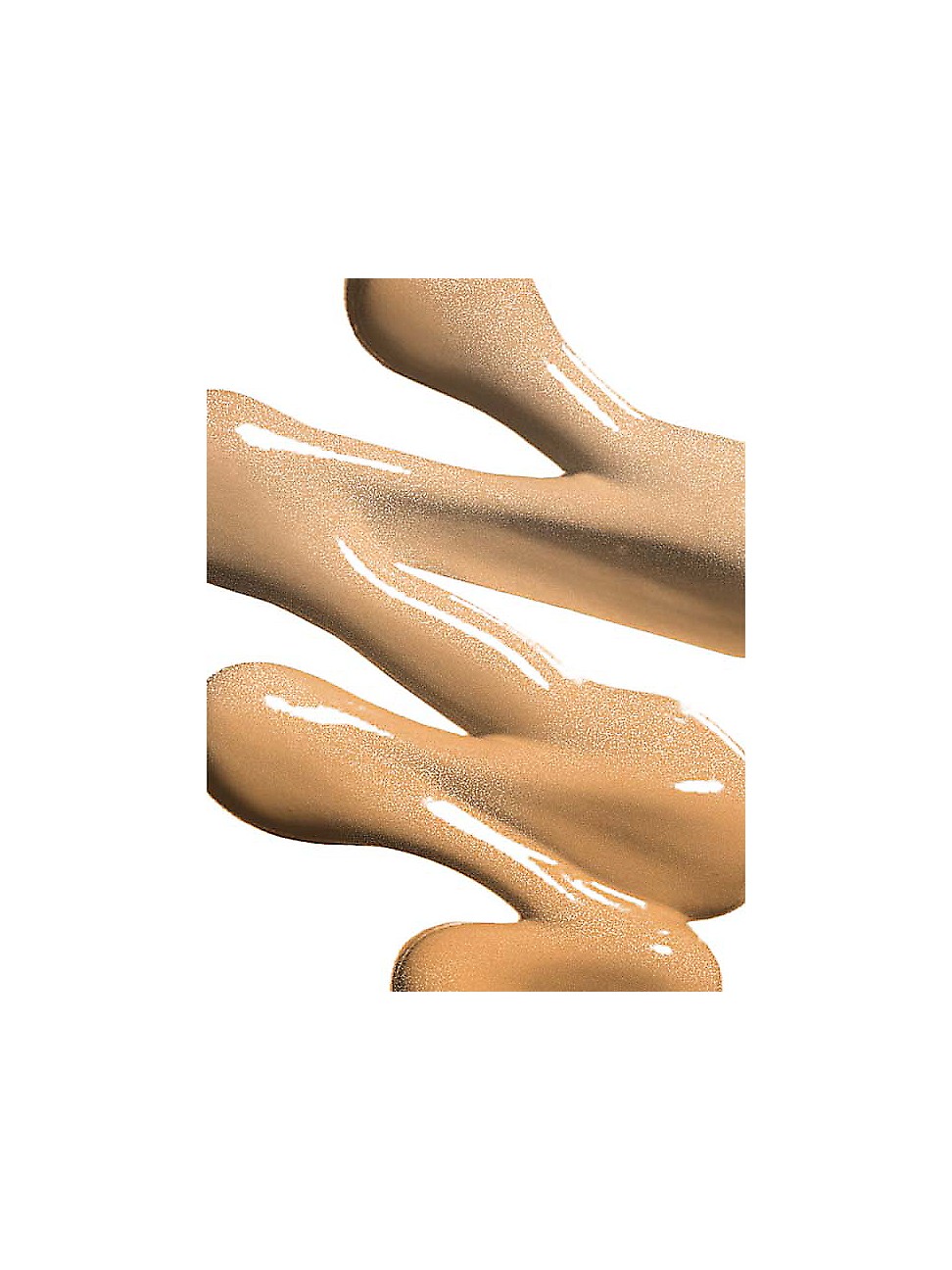 Luminous Silk Foundation in a creamy, golden beige shade, showcasing a smooth, liquid texture with a shimmering finish, ideal for a radiant complexion.