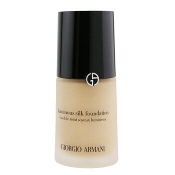 Luminous Silk Foundation by Giorgio Armani in a 30 ml glass bottle, featuring a sleek black cap and a beige liquid inside, labeled with elegant gold text.