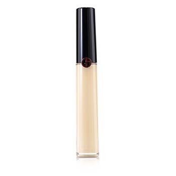 Giorgio Armani Fabric Corrector in a sleek, transparent tube with a black cap, featuring a round logo, containing 6 ml of product in a light beige shade (3).