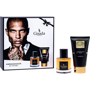 Gisada Ambassador Gift Set for Men featuring a sleek black box with a ribbon, includes a fragrance bottle and a shower gel tube, both elegantly designed with gold accents.