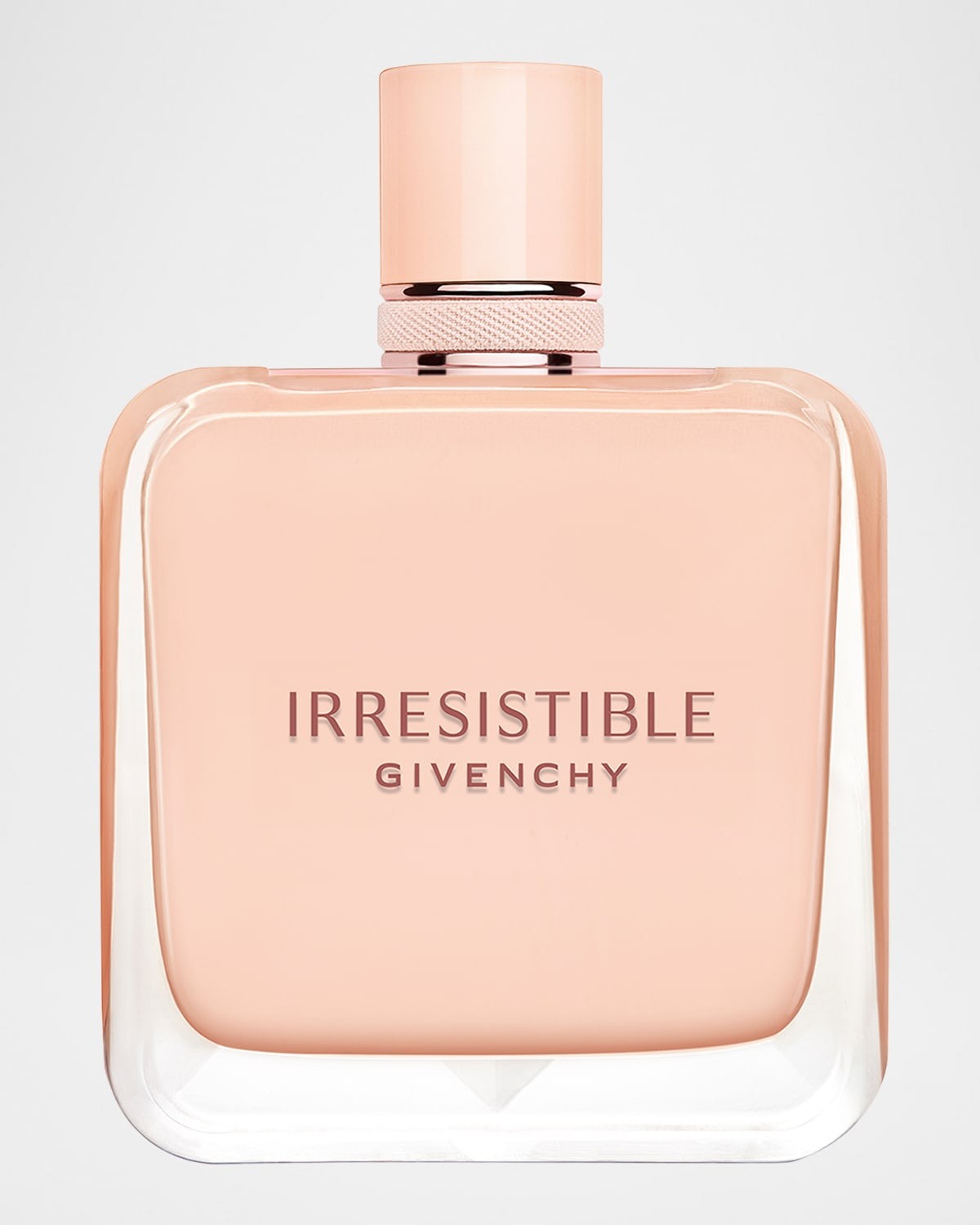 Square glass bottle with a soft pink hue, featuring a sleek design, a metallic cap, and the embossed text "IRRESISTIBLE GIVENCHY" on the front.