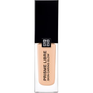GIVENCHY Prisme Libre Skin-Caring Glow Foundation in a beige shade, housed in a sleek glass bottle with a black cap and the Givenchy logo on the front.