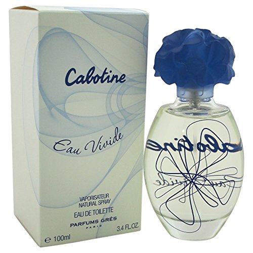 Clear glass bottle with a blue floral cap, featuring a swirling blue design and the name "Cabotine Eau Vivide" in elegant script, alongside a light green box.