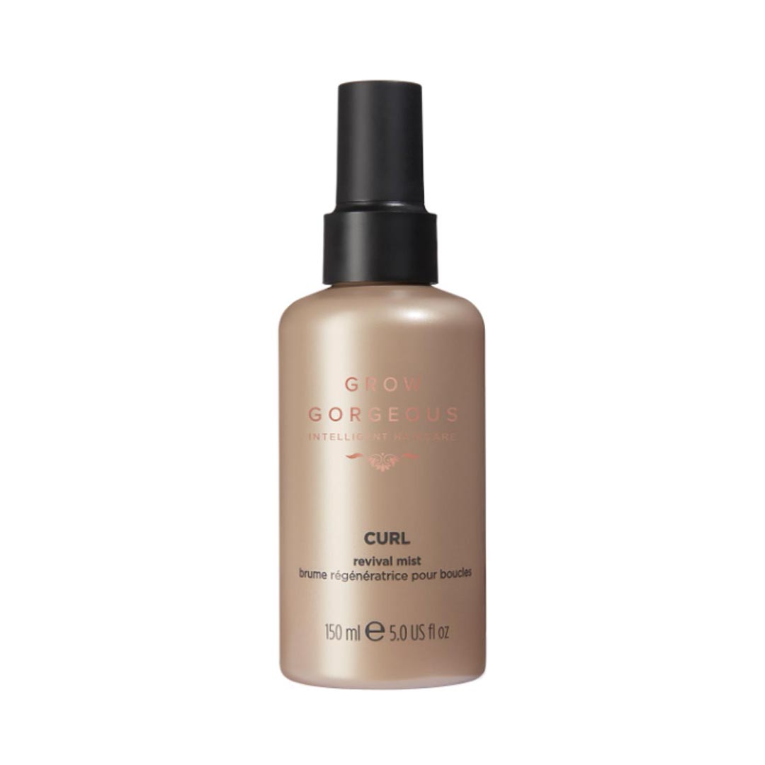 A 150ml spray bottle of Grow Gorgeous Curl Revival Mist, featuring a sleek, matte beige design with rose gold text, ideal for enhancing and revitalizing curls.