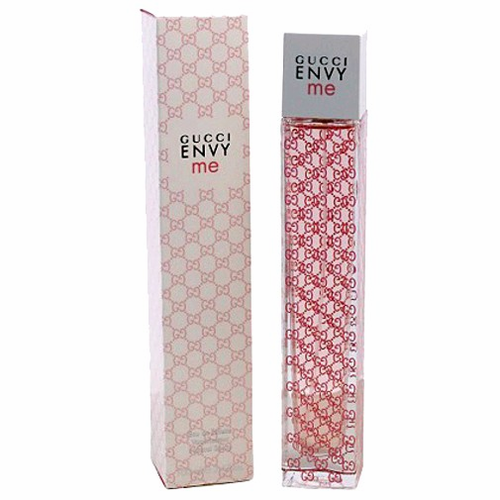 Clear glass bottle of Gucci Envy Me Eau De Toilette, featuring a pink and white patterned box with the brand name and product title in bold lettering.