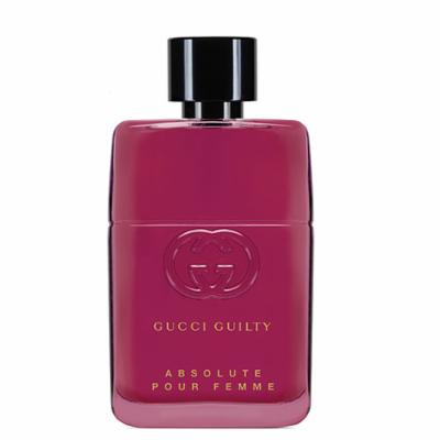 Gucci Guilty Absolute Pour Femme is a 1 oz pink glass perfume bottle with a sleek design, featuring a black cap and gold lettering on the front.