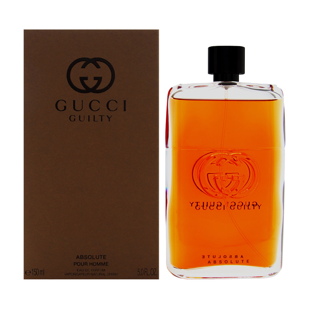 Clear glass bottle with a black cap, featuring the embossed Gucci logo, alongside a brown cardboard box displaying the product name and details.
