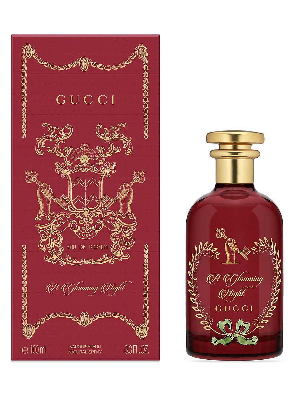 Deep red box featuring ornate gold detailing and a key design, alongside a matching glass bottle with a gold cap, labeled "A Gloaming Night" in elegant script.