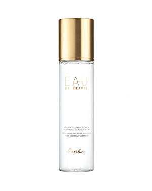 Clear glass bottle with a gold cap, labeled "Eau De Beaute" in elegant font, containing a refreshing micellar solution for women, 200ml size.