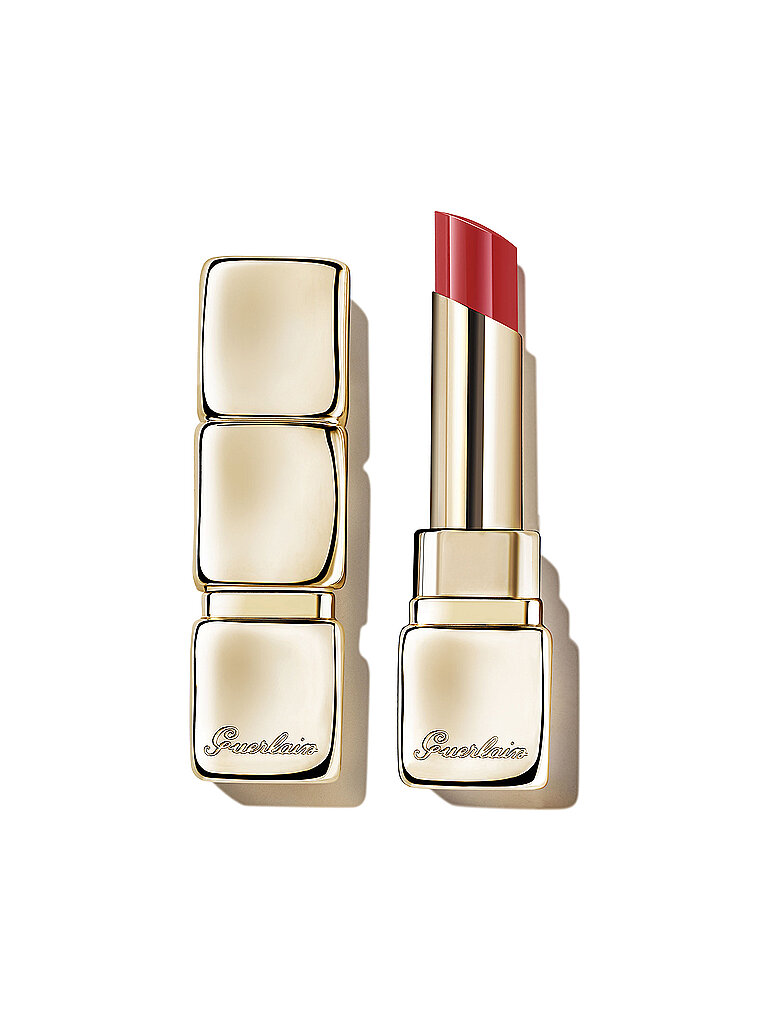 Guerlain KissKiss Shine Bloom Lip Color in vibrant fuchsia, featuring a sleek gold casing with three stacked squares and a glossy bullet tip.