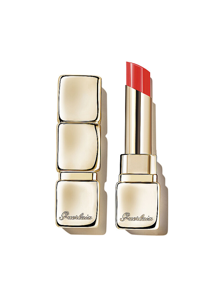 Gold rectangular lipstick case with three stacked sections, featuring a glossy red bullet labeled "520 Love Bloom" from GUERLAIN's KissKiss Shine Bloom collection.